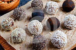 Assorted Vegan Sweets, Delicious Candy Balls with seeds, dried fruit, nuts, and cocoa powder, Healthy Candies