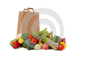 Assorted vegetables with a grocery sack