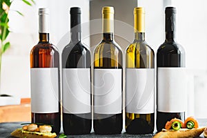 Assorted wine drinks in bottles. Alcoholic luxury drinks