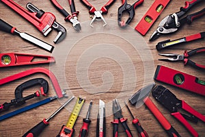 Assorted work tools on wood