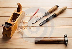 Assorted work tools on woodenn photo