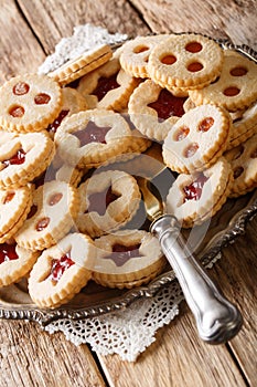 Assortement of christmas cookies vanilla kipferl, linzer cookie close-up. Vertical