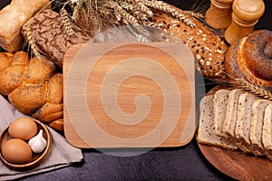 Assortment of baked bread on grey background. Gluten free breads .