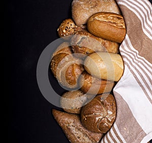 Assortment of baked goods on black table