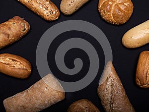 Assortment of baked goods on black table