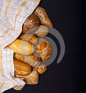 Assortment of baked goods on black table