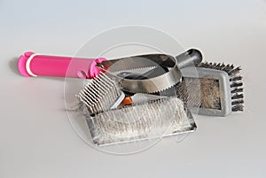 Assortment of Cat Brushes with Cat Hair