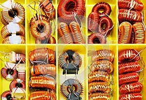 Assortment of choke coils in a yellow box