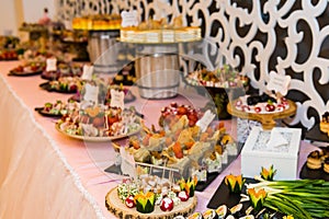 An assortment of colored appetizers and antipasti snacks