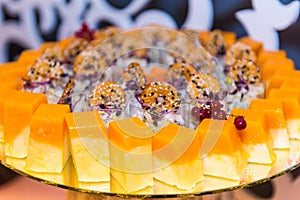 An assortment of colored appetizers and antipasti snacks