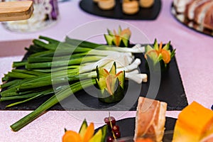 An assortment of colored appetizers and antipasti snacks