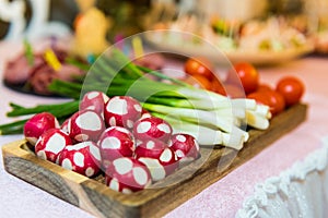 An assortment of colored appetizers and antipasti snacks