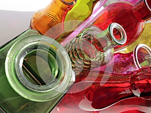 assortment of colorful bottles and reflections.. Dig deep