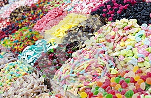 Assortment colorful gummy candies at market