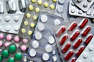 Assortment of colorful pills and vitamins