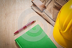 Assortment of construction tools on wooden board