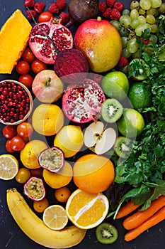 Assortment of different fruits and vegetables in rainbow colors