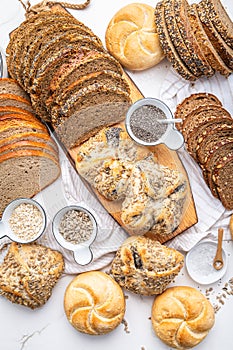 Assortment of different kind of cereal bakery - bread, pasties, buns, with healthy seeds