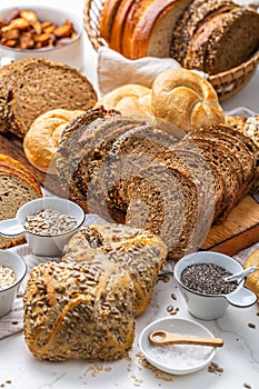 Assortment of different kind of cereal bakery - bread, pasties, buns, with healthy seeds