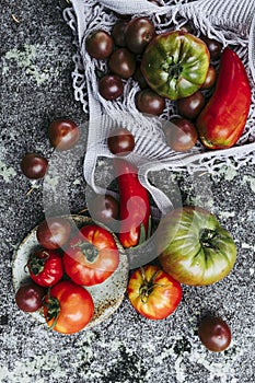 Assortment of different varieties of fresh tomatoes from the vegetable garden
