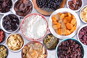 Assortment of dried fruit in individual dishes