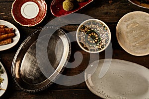 Assortment of empty rustic dishes on a table