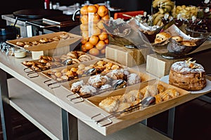 Assortment of fresh pastry on table in buffet