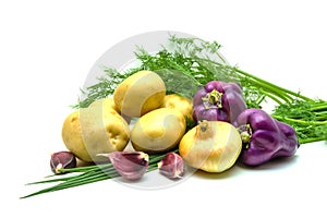 Assortment of fresh raw vegetables on white background. Selection includes potato, tomato, green onion, pepper, garlic and dill