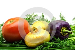 Assortment of fresh raw vegetables on white background. Selection includes potato, tomato, green onion, pepper, garlic and dill