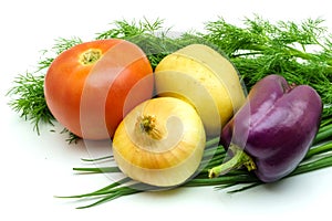 Assortment of fresh raw vegetables on white background. Selection includes potato, tomato, green onion, pepper, garlic and dill