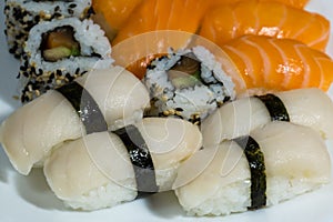 Assortment of fresh sushi, sushi with salmon, butterfish, rolls