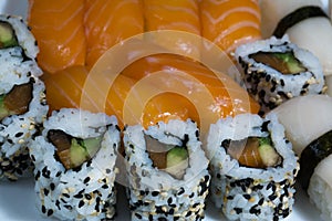 Assortment of fresh sushi, sushi with salmon, butterfish, rolls