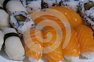 Assortment of fresh sushi, sushi with salmon, butterfish, rolls