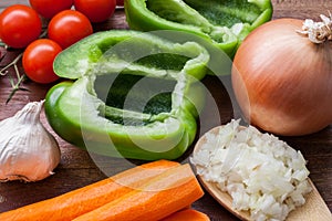 Assortment of fresh vegetables on a wooden table/soup preparation