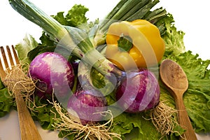 Fresh fruits and vegetables on lettuce background photo