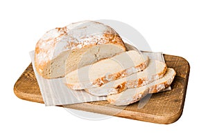 Assortment of freshly sliced baked bread with napkin isolated on white background. Healthy unleavened bread. French