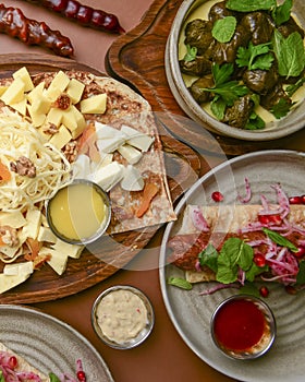 Assortment of georgian food, flat lay. Top view on traditional georgian cuisine close up