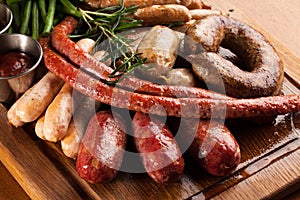 Assortment of grilled sausages.