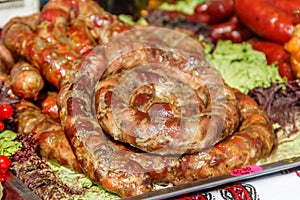 Assortment of grilled sausages for sale. Street food, fast food