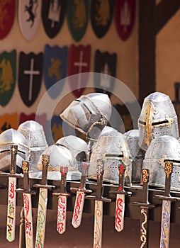 An Assortment of Helmets, Shields and Swords