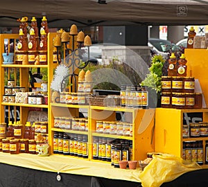 Assortment of honey and beeswax products. Farmers market.