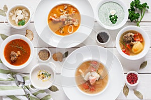 Assortment of hot soups flat lay