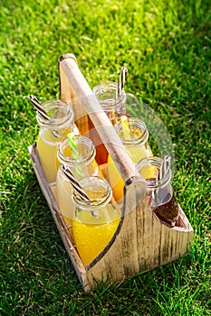 Assortment of lemonade and ice tea in bottles