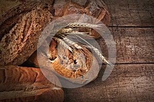 Assortment of loaves of bread on wood