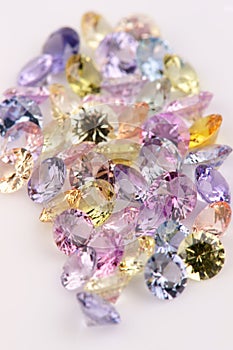 Assortment of multicolored Precious Stones. photo