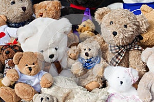 Assortment of old teddies at flea market