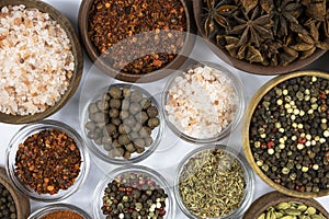 Assortment of oriental spices close-up on white background
