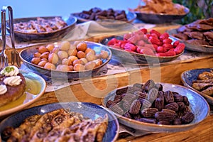 An assortment of pastries beckons from a rustic table, warm and inviting. Their richness belies the trend towards plant