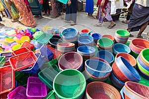 Assortment of plastic kitchenware on Burmese open air market on Inle lake, Myanmar