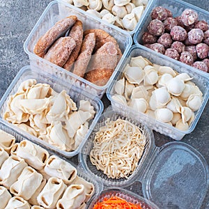 Assortment of Pocket items. Semifinished meatballs, dumplings, pierogi.